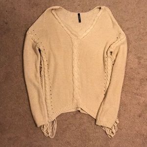 Boutique distressed style cream sweater